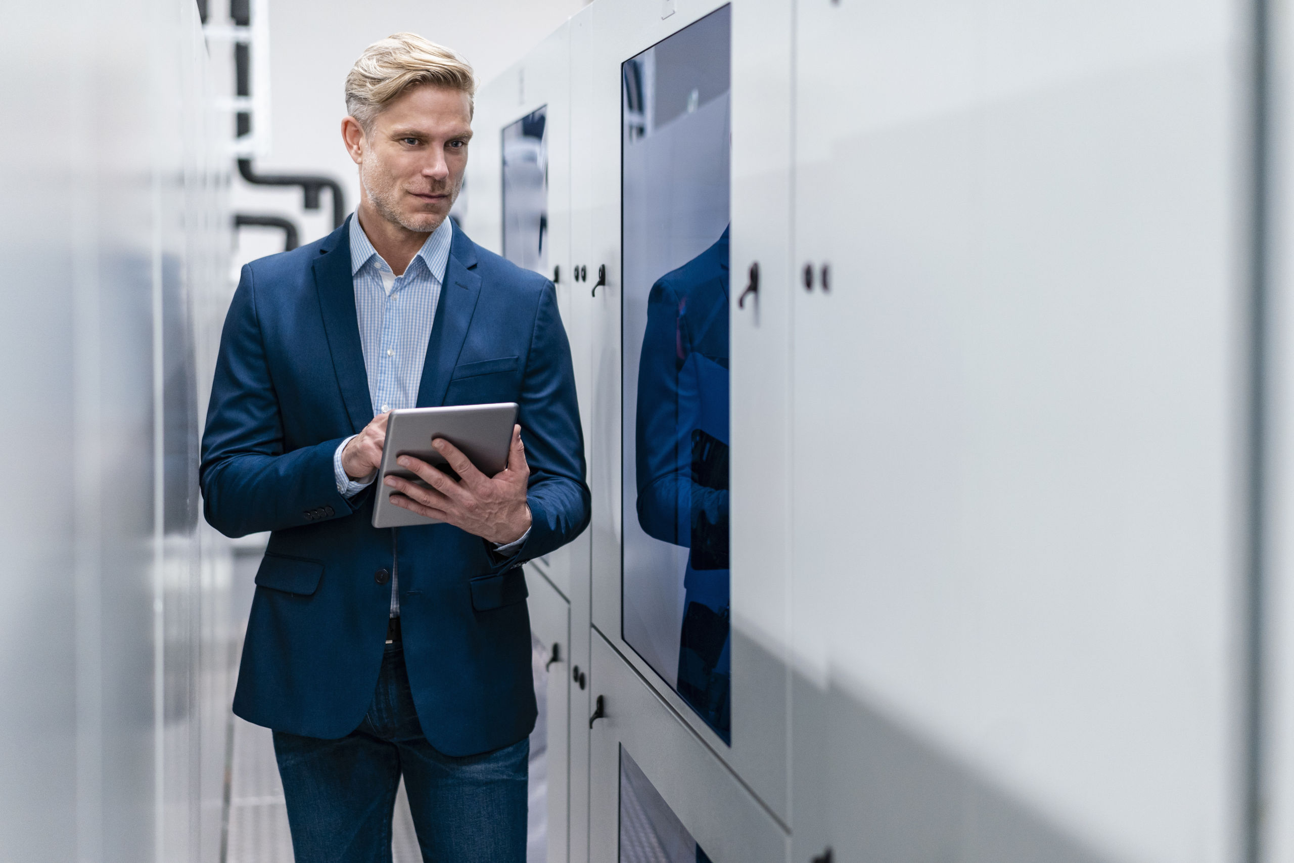 businessman holding tablet 