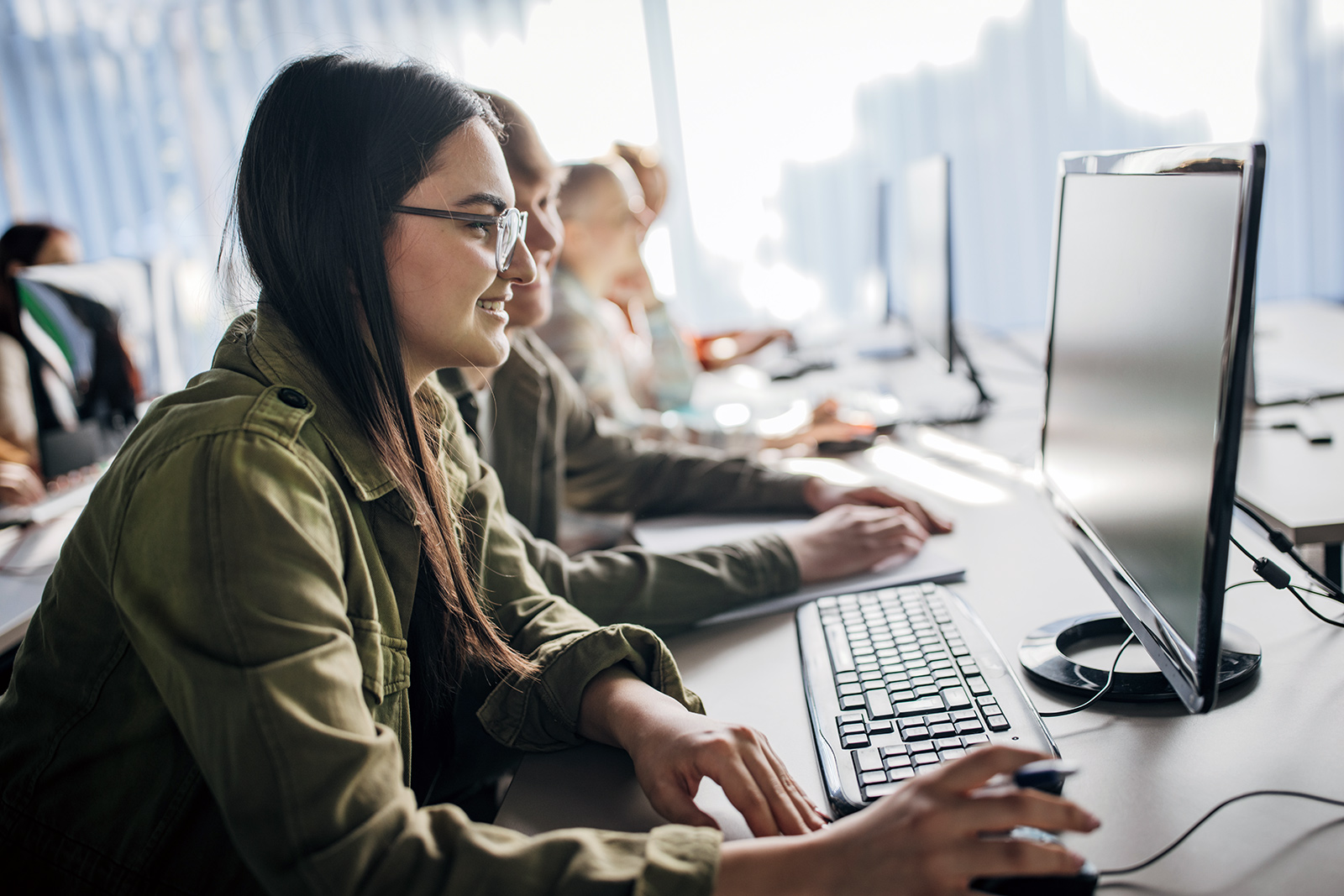 People are working on a computer.