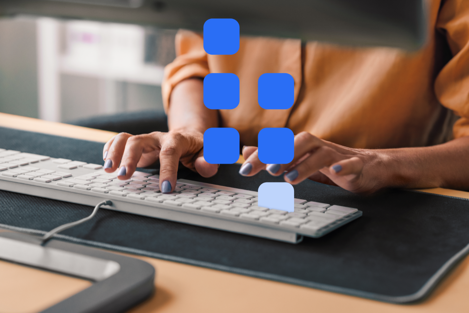 Person types on the keyboard