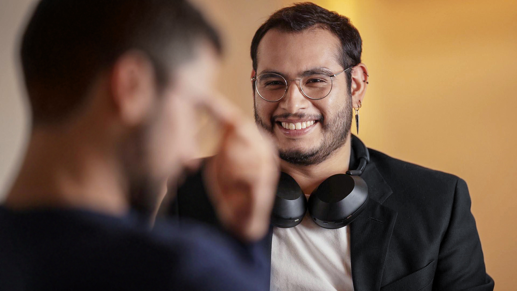 Diego Barrera Martinez, a software developer, smiles during a conversation.