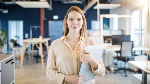 Woman holding files in the office