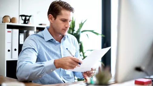 Man sitting at the workplace in the office