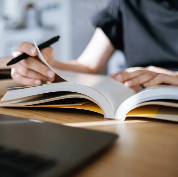 A close-up of a person learning.