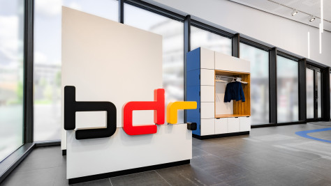 The image shows the show pavilion entrance with the Bundesdruckerei Group logo