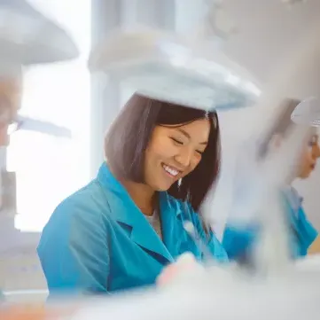 Dental laboratory female dental technician
