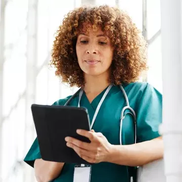 Woman doctor tablet