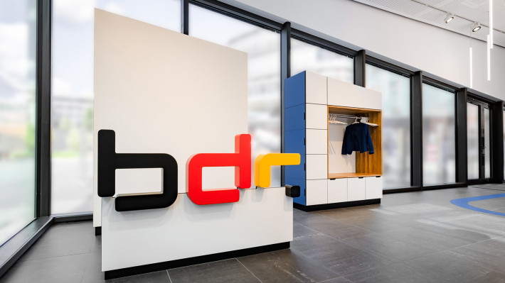 Das Bild zeigt die Foto-Opportunity im Showpavillon mit Bundesdruckerei-Gruppen-Logo
