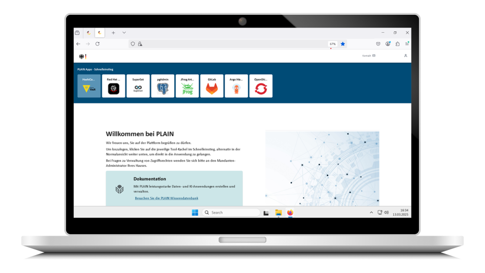 PLAIN Platform homepage on a laptop